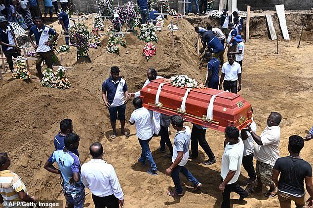 12602894-6950613-burials_for_the_dead_began_today_in_negombo_pictured_the_attacks-a-27_1556024607681-1036631