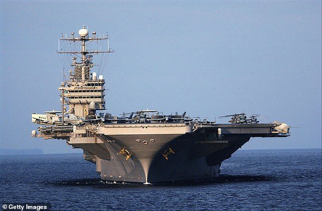 13424434-7020139-the_uss_abraham_lincoln_aircraft_carrier_pictured_is_replacing_a-a-59_1557742388785-7816685